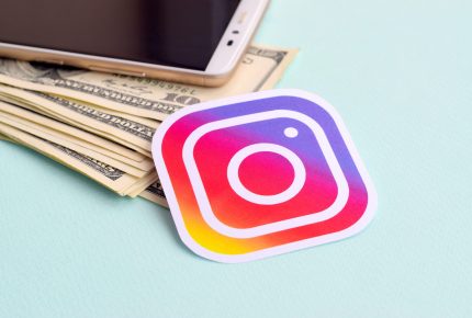 Instagram,Paper,Logo,Lies,With,Envelope,Full,Of,Dollar,Bills